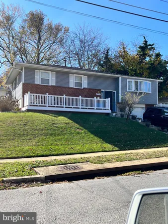 a view of a yard with a patio