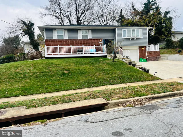 front view of house with a yard