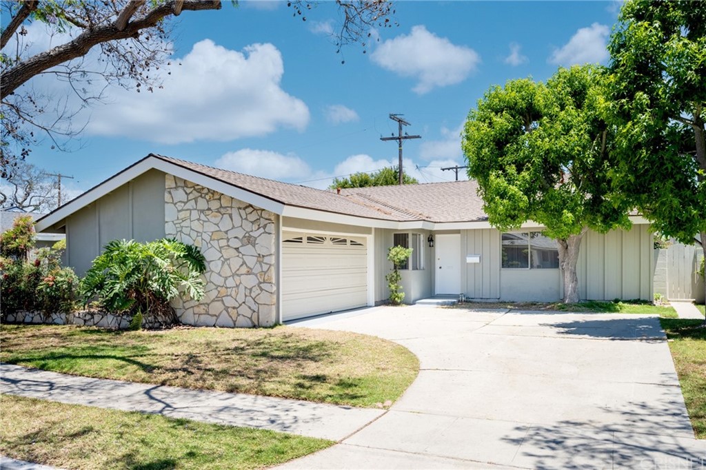 2868 Heather Road Long Beach, CA 90815 - Photo 1 of 1 a front view of a house with a yard and potted plants