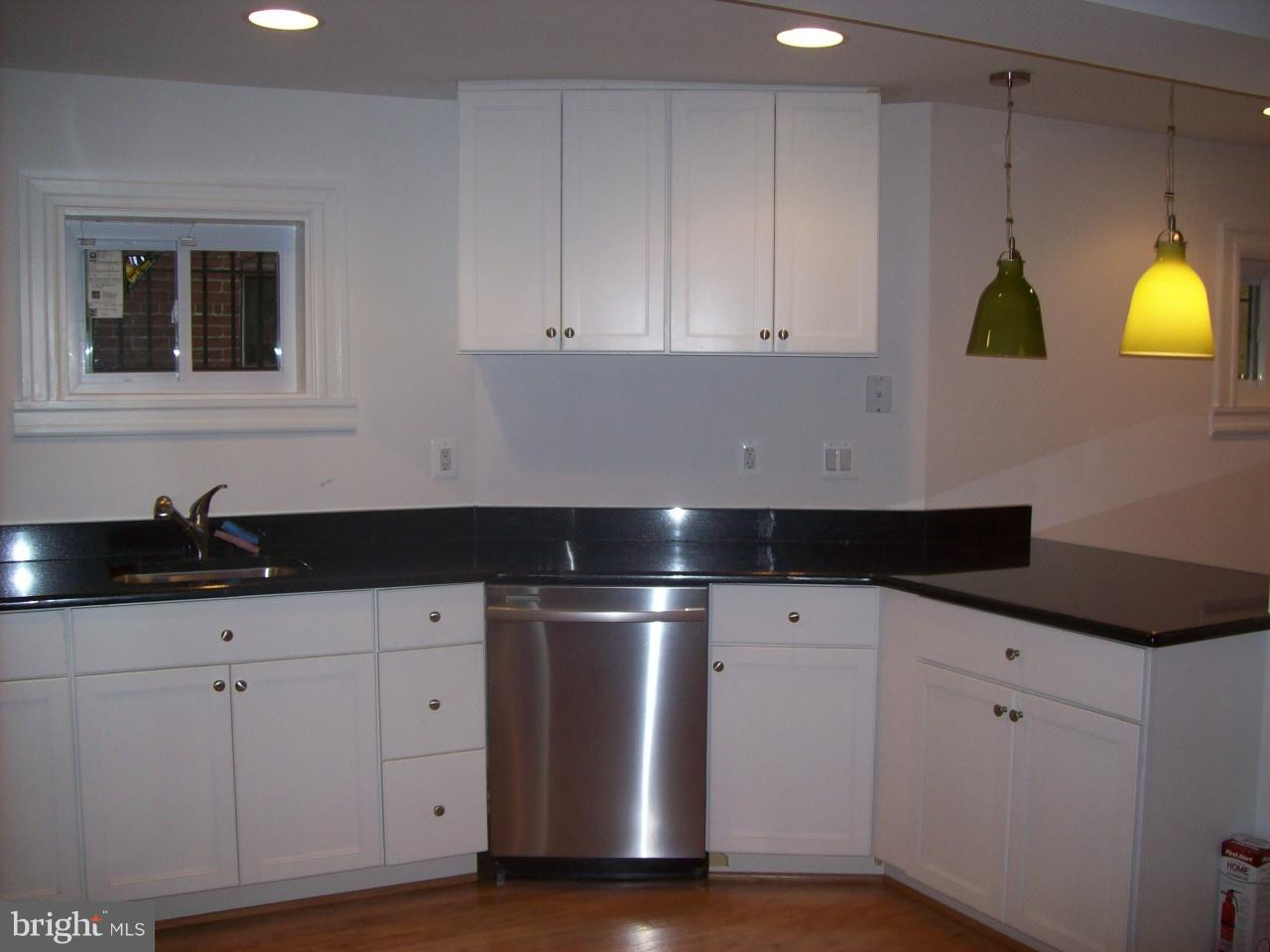 1740 Park Road Northwest Washington, DC 20010 - Photo 7 of 30 Kitchen with stainless steel dishwasher