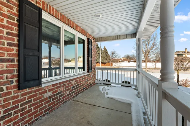 a view of a room with a large window