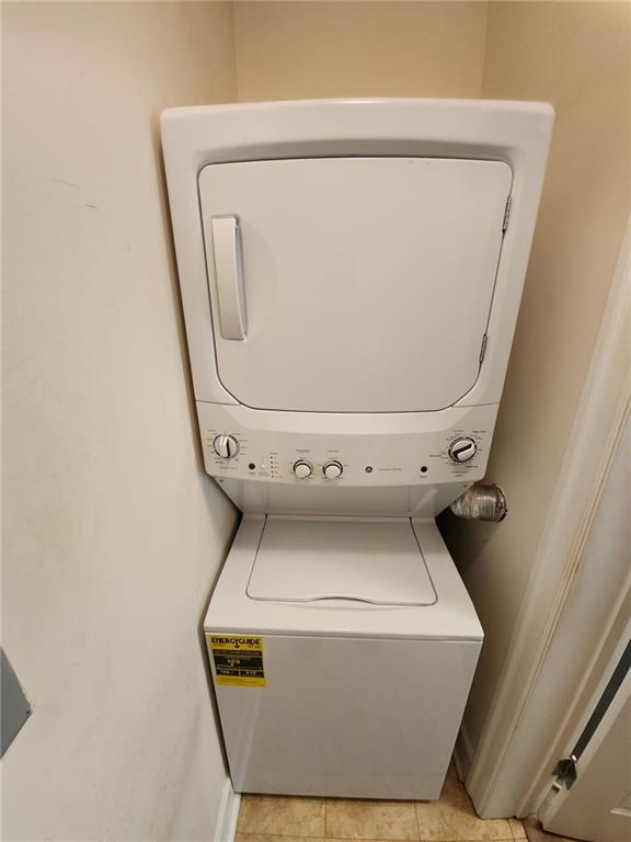 325 East Paces Ferry Road Northeast, Unit 1409 Atlanta, GA 30305 - Photo 10 of 14 a utility room with dryer and washer
