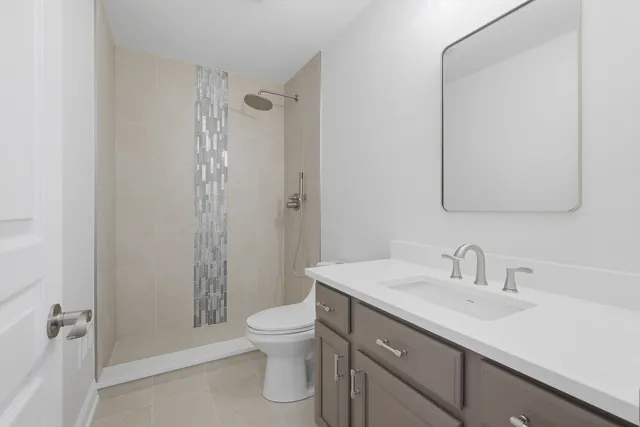 a view of empty room with wooden walls