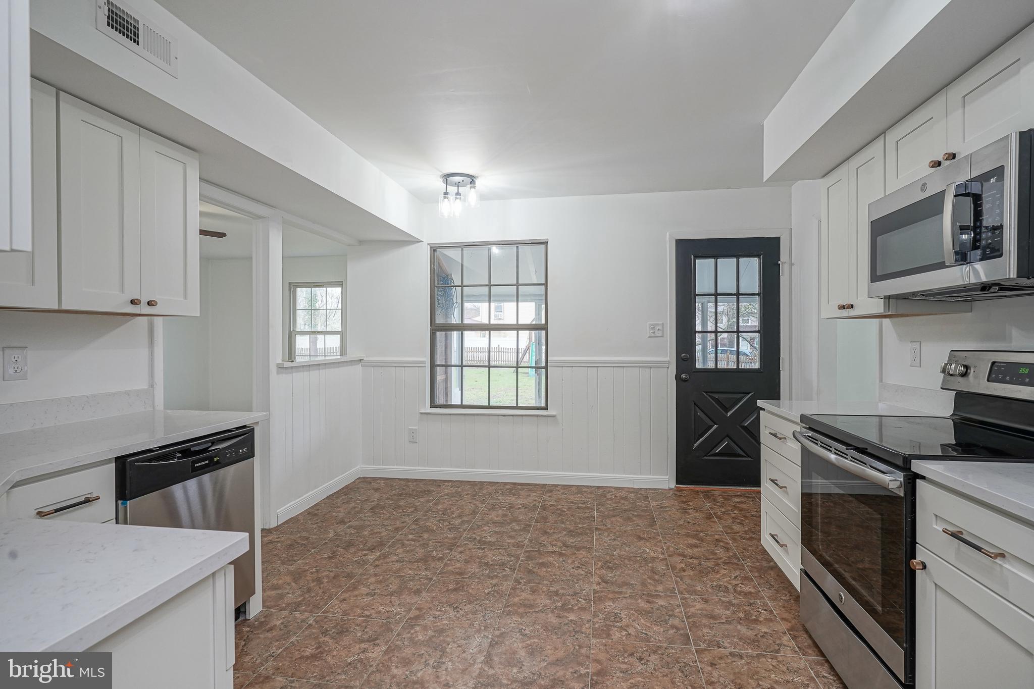 5 Wickham Lane Westampton, NJ 08060 - Photo 12 of 32 a kitchen with stainless steel appliances granite countertop a stove and a refrigerator