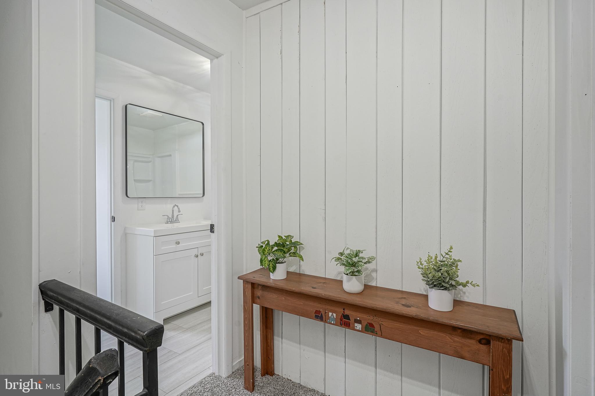 5 Wickham Lane Westampton, NJ 08060 - Photo 18 of 32 a room with a sink and a mirror