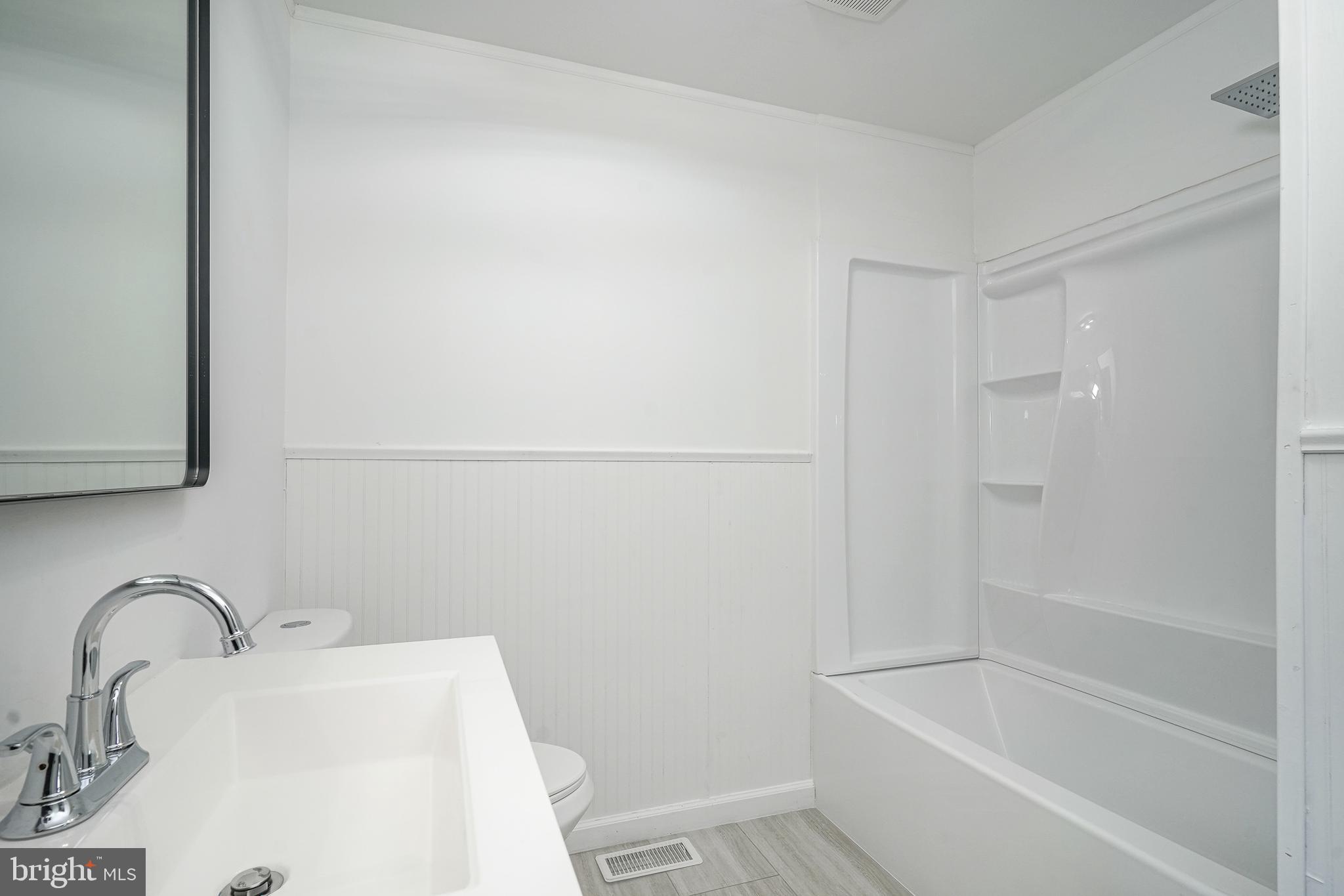 5 Wickham Lane Westampton, NJ 08060 - Photo 22 of 32 a bathroom with a sink and a bathtub