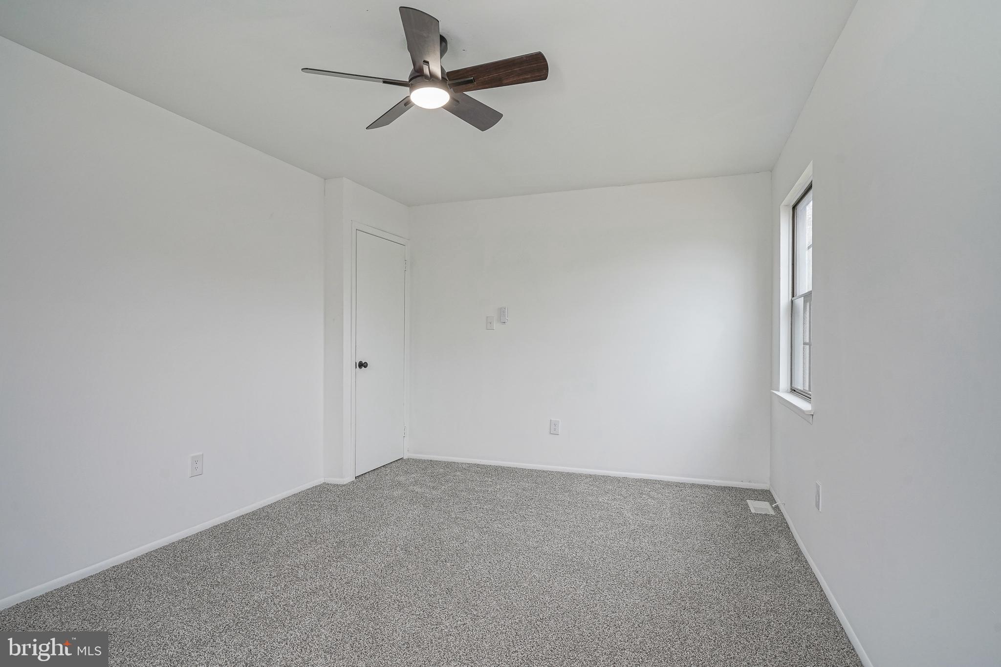5 Wickham Lane Westampton, NJ 08060 - Photo 26 of 32 an empty room with a window and a fan