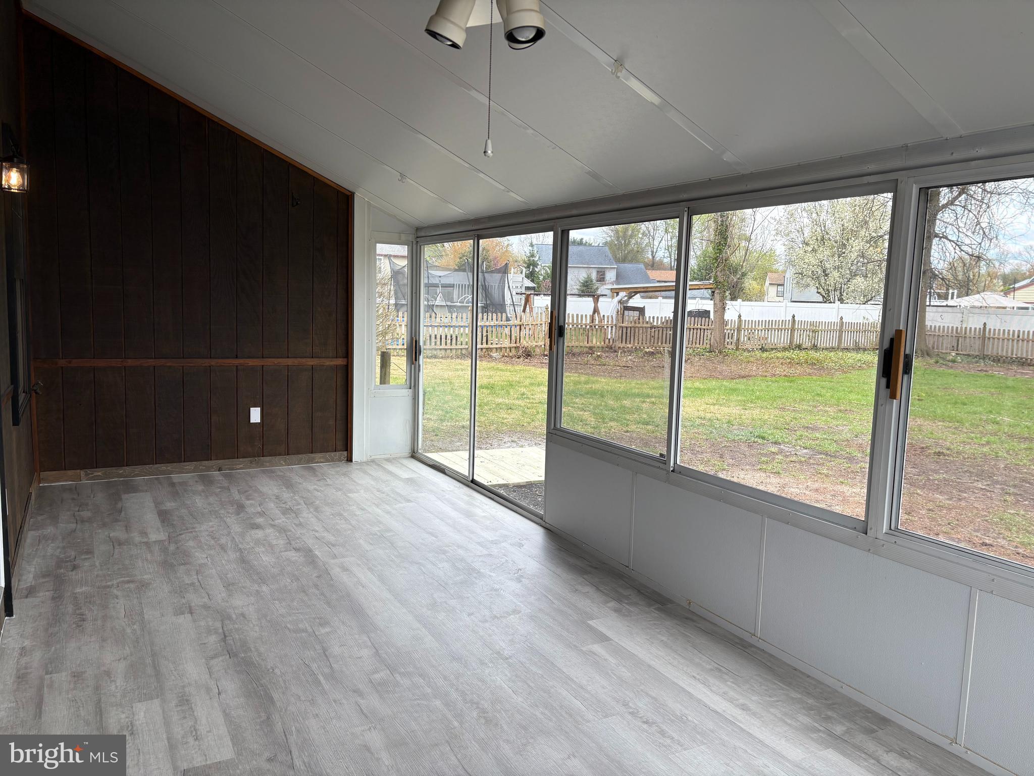 5 Wickham Lane Westampton, NJ 08060 - Photo 30 of 32 a view of an empty room with wooden floor and a window