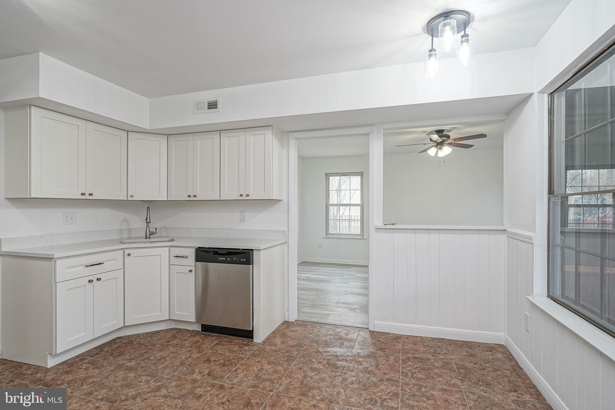 5 Wickham Lane Westampton, NJ 08060 - Photo 10 of 32 a kitchen with a sink and cabinets