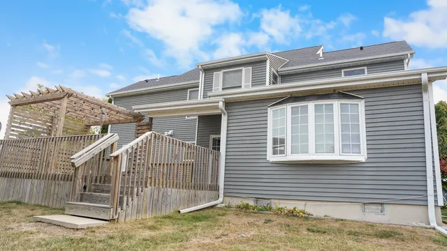 a view of a balcony with wooden floor
