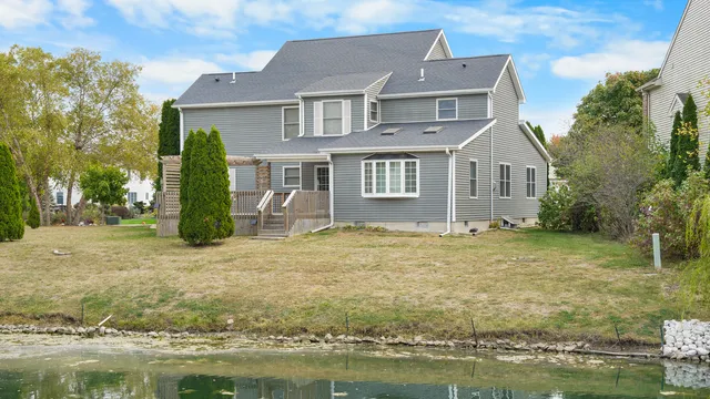 a view of lake with green space