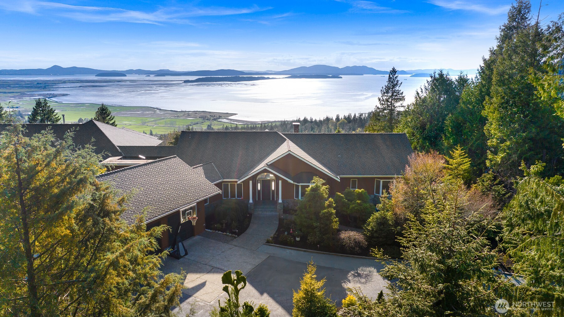 15949 Mountain Drive Bow, WA 98232 - Photo 1 of 1 an aerial view of a house with a yard wooden table and chairs