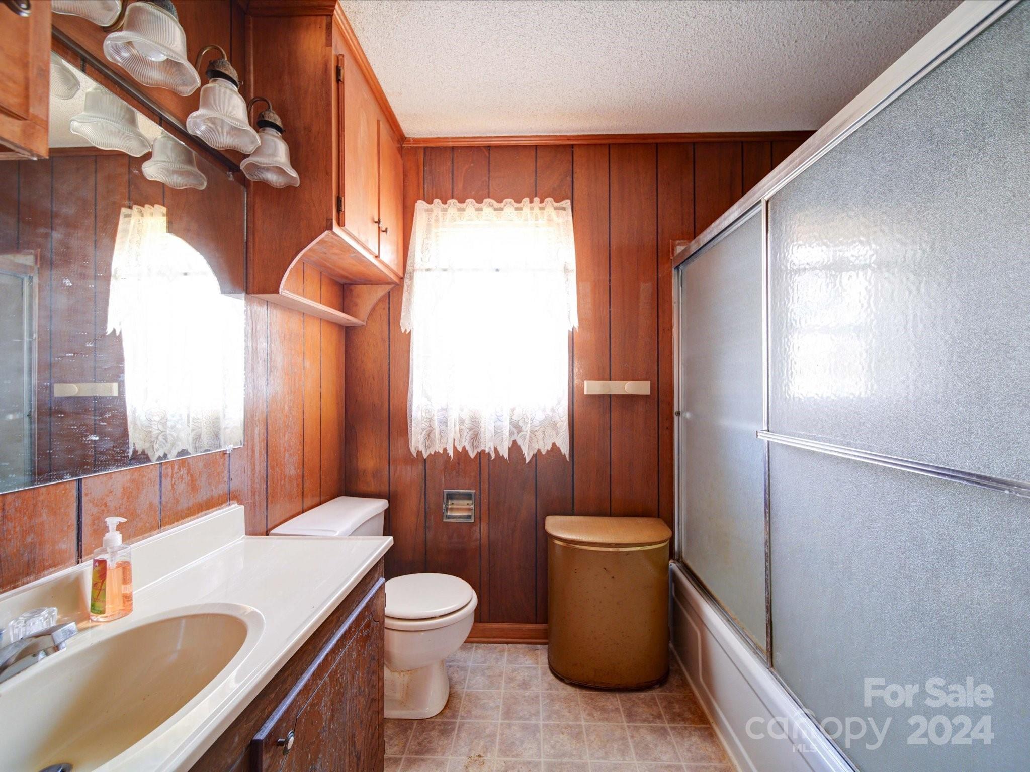 1869 State Rd S-29-584 Lancaster, SC 29720 - Photo 2 of 44 a bathroom with a granite countertop sink toilet and shower