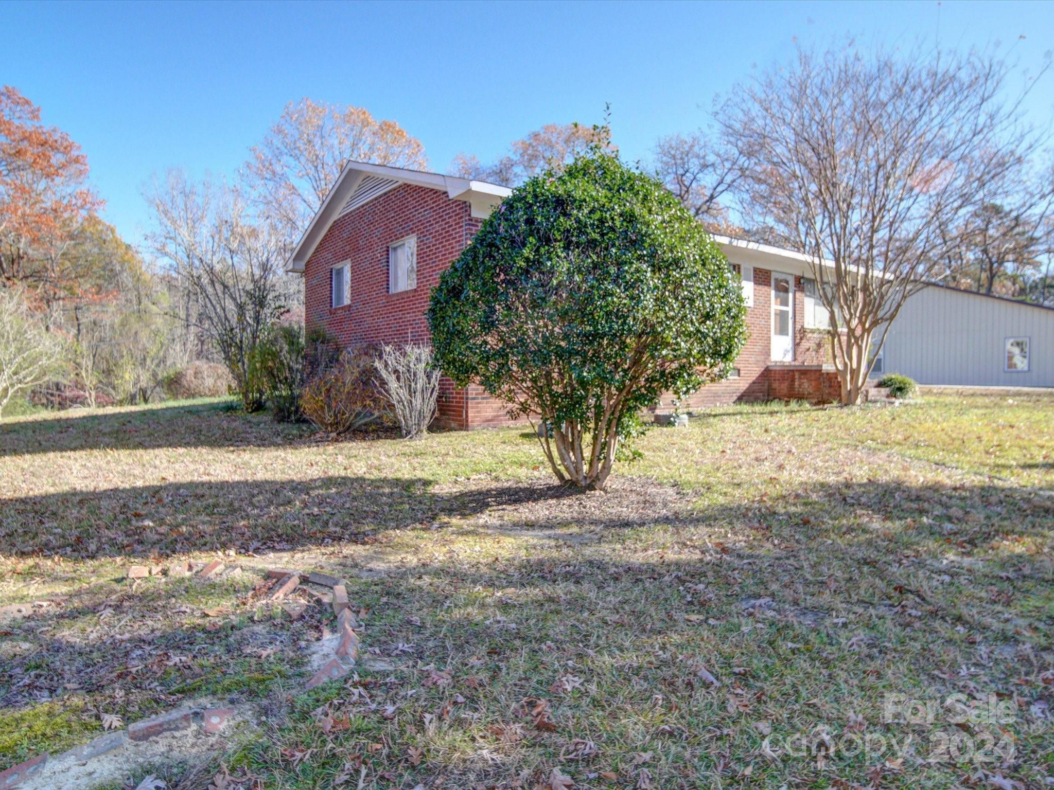 1869 State Rd S-29-584 Lancaster, SC 29720 - Photo 26 of 44 a view of a yard with a house