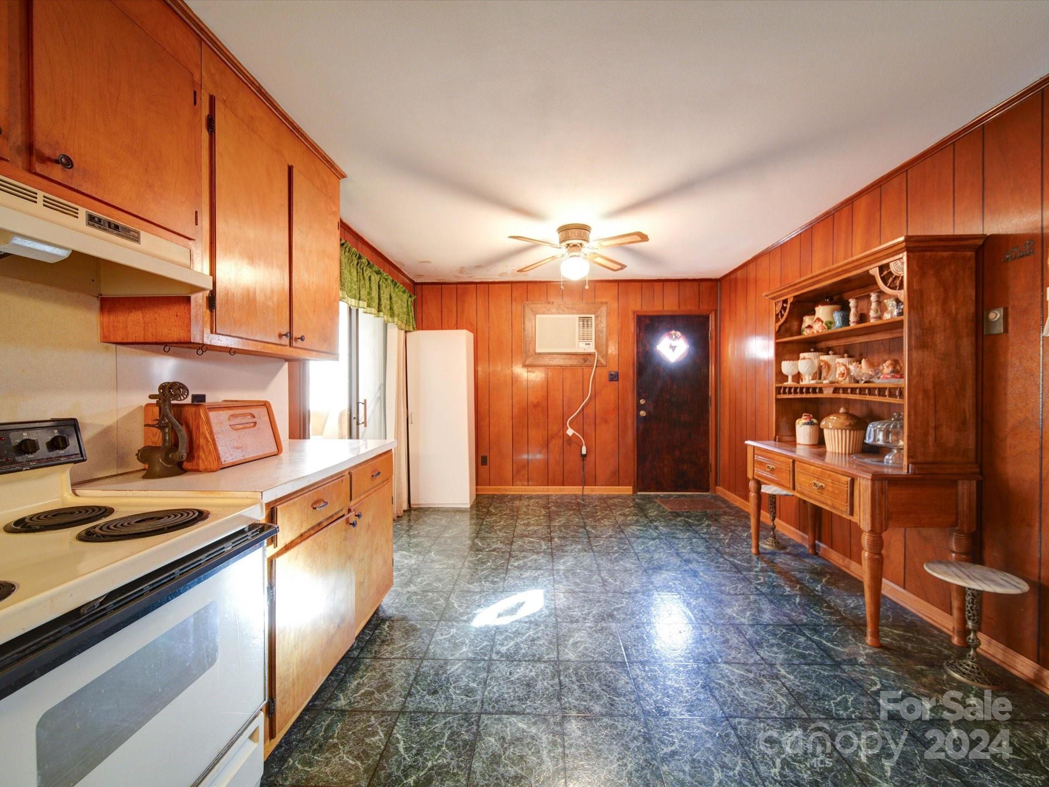 1869 State Rd S-29-584 Lancaster, SC 29720 - Photo 10 of 44 a kitchen with stainless steel appliances granite countertop a sink and cabinets