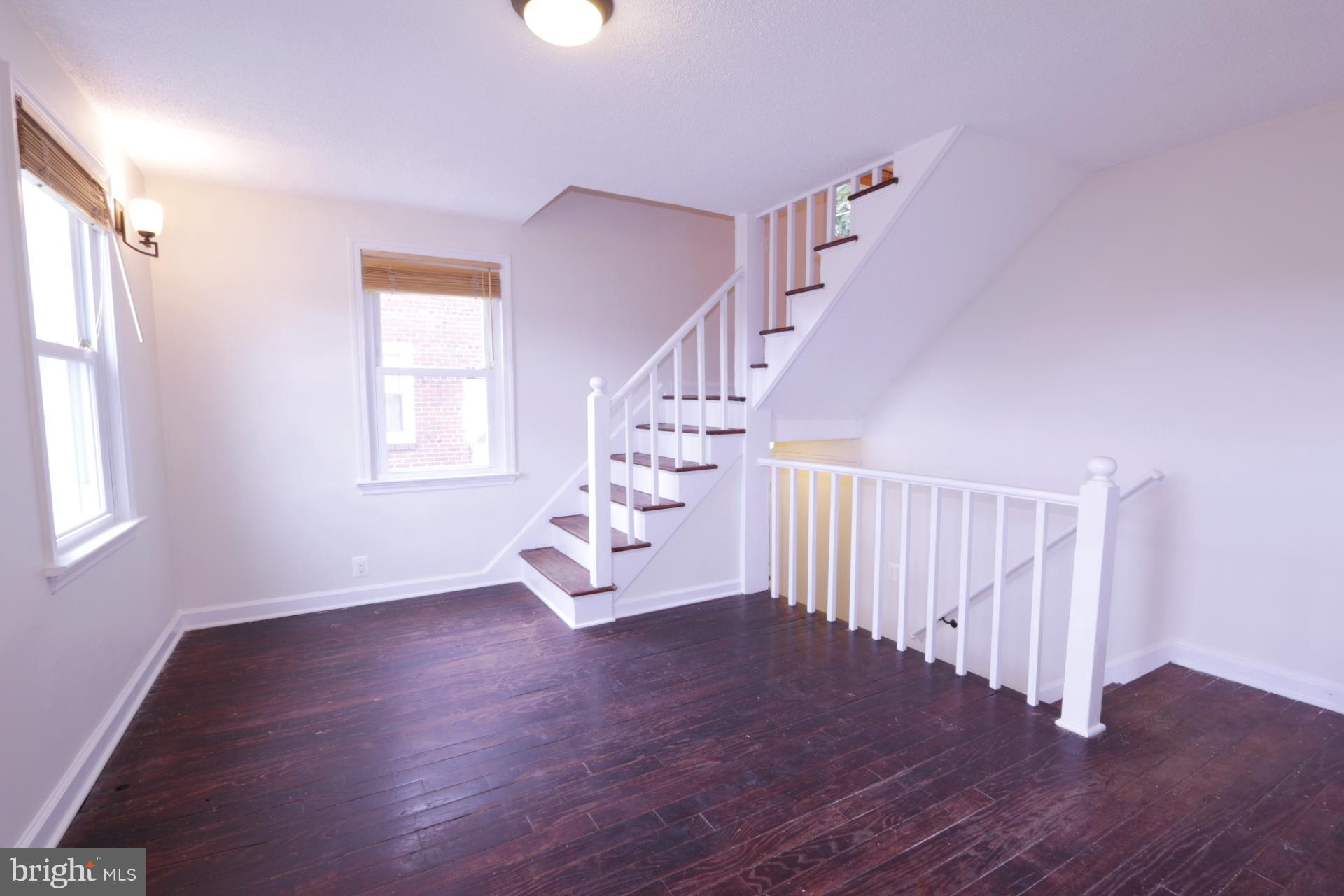 3723 South Kemper Road Arlington, VA 22206 - Photo 3 of 15 a view of entryway with wooden floor and stairs