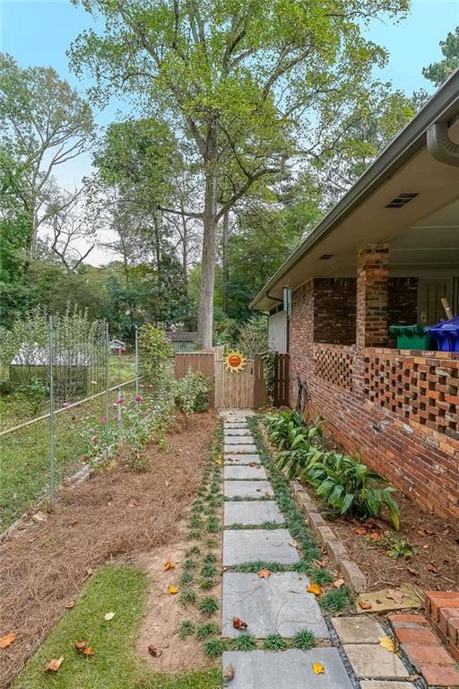 1445 Linkwood Lane Decatur, GA 30033 - Photo 2 of 30 a front view of a house with a yard