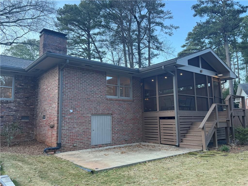 1445 Linkwood Lane Decatur, GA 30033 - Photo 25 of 30 a front view of a house with a garden