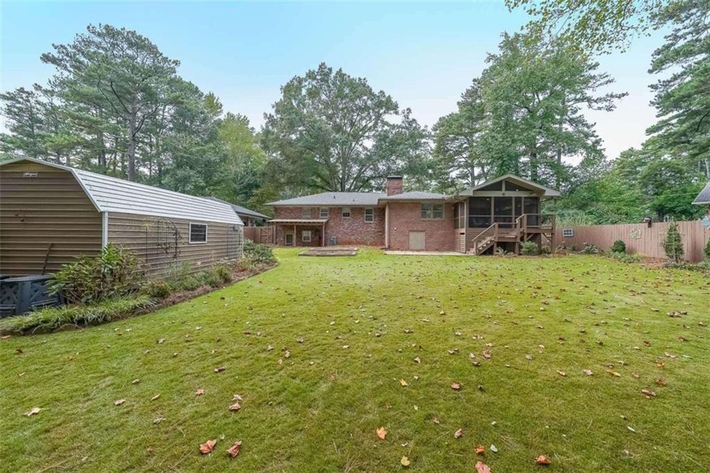 1445 Linkwood Lane Decatur, GA 30033 - Photo 27 of 30 a view of a house with backyard and sitting area
