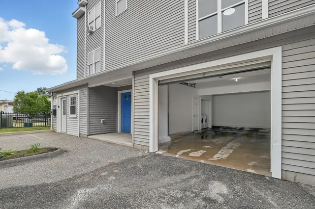 a view of a house with a garage