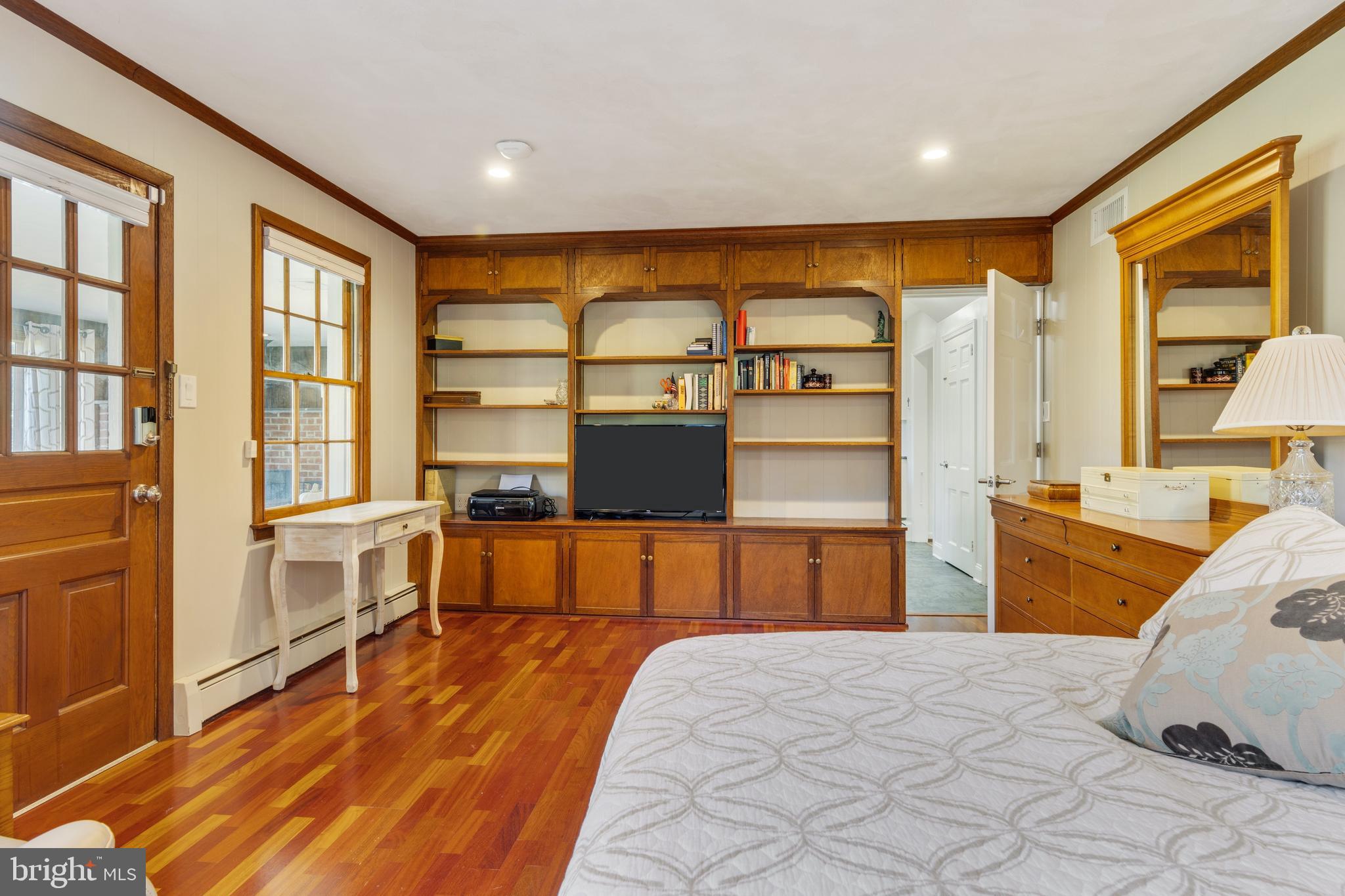 235 Chamounix Road Wayne, PA 19087 - Photo 14 of 32 a bedroom with a large bed and a large window