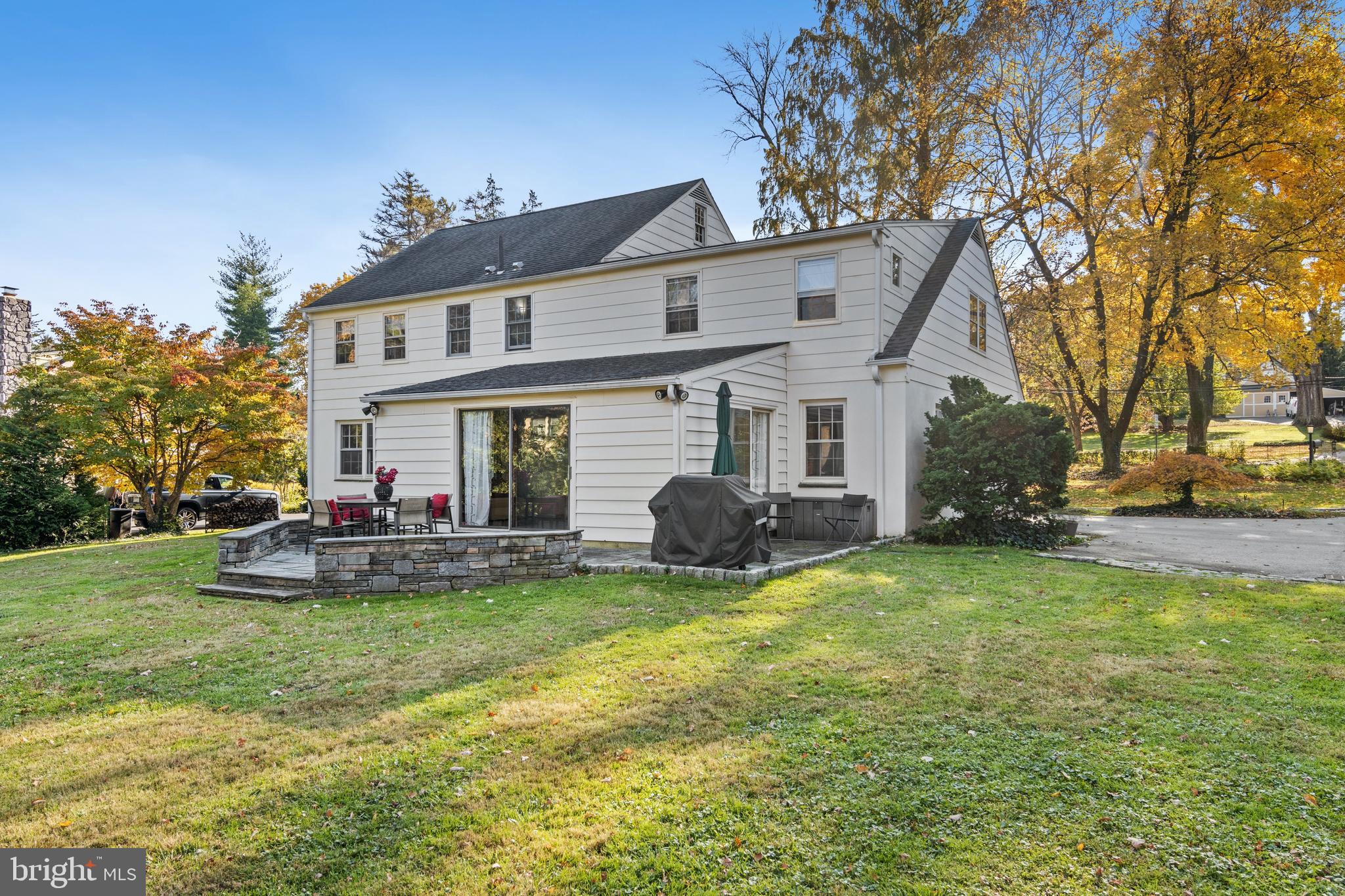 235 Chamounix Road Wayne, PA 19087 - Photo 3 of 32 a view of a house with swimming pool and a yard