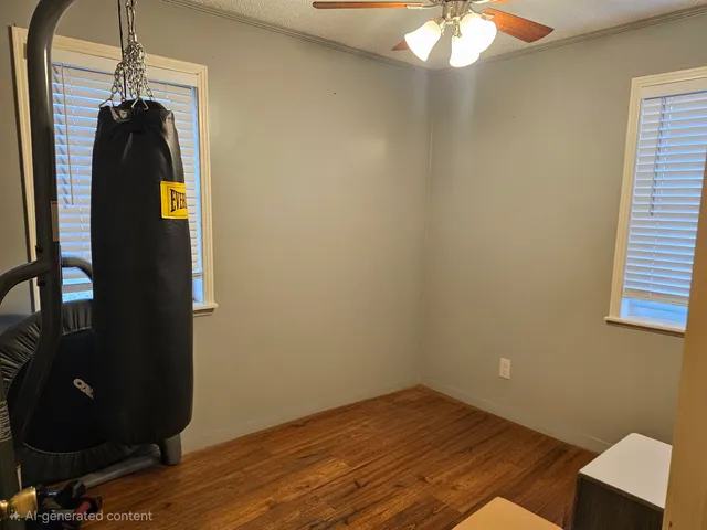 a view of a room with wooden floor and closet