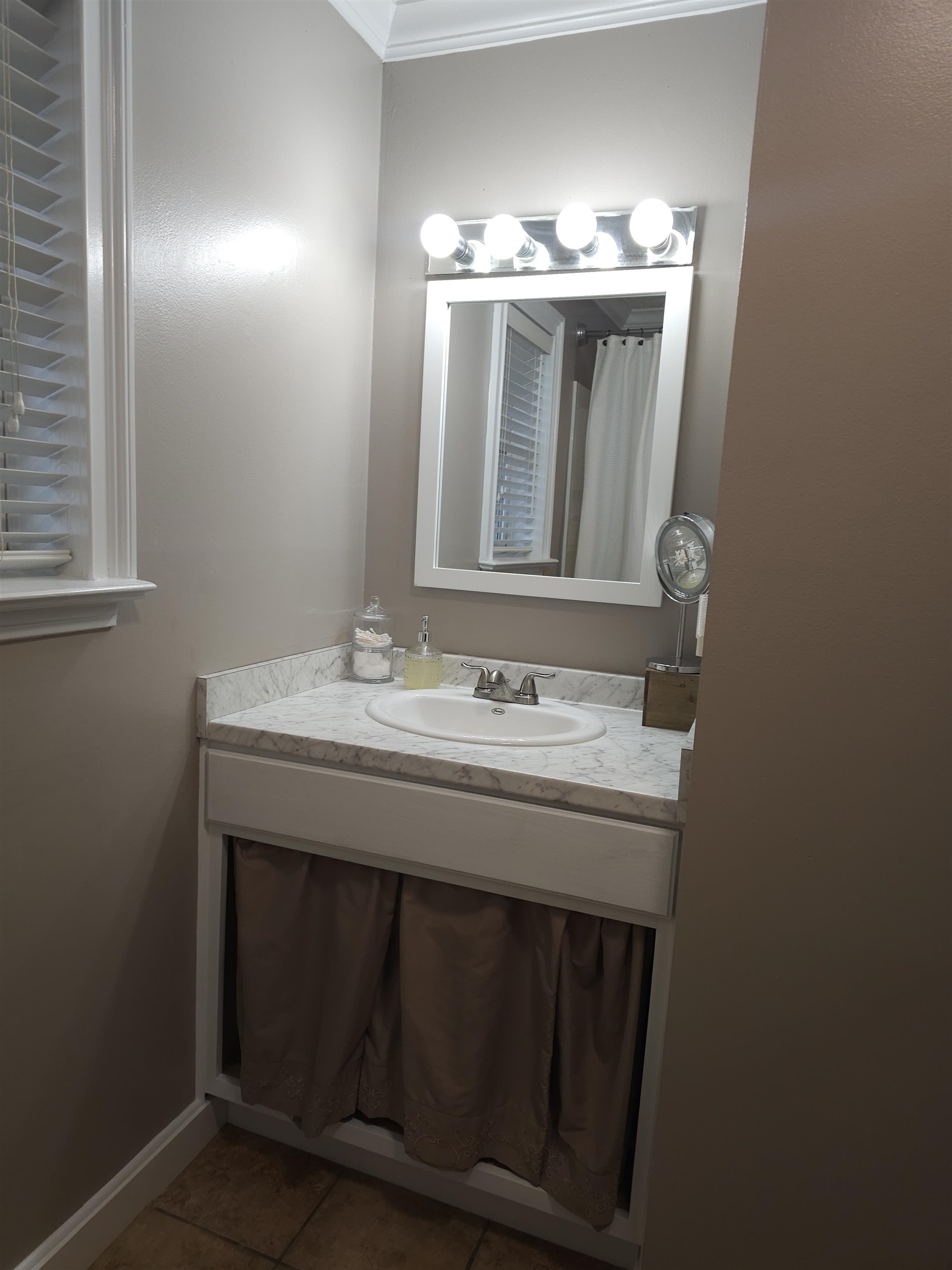 3920 Antioch Highway 51 Road Covington, TN 38019 - Photo 18 of 25 a bathroom with a sink and a mirror