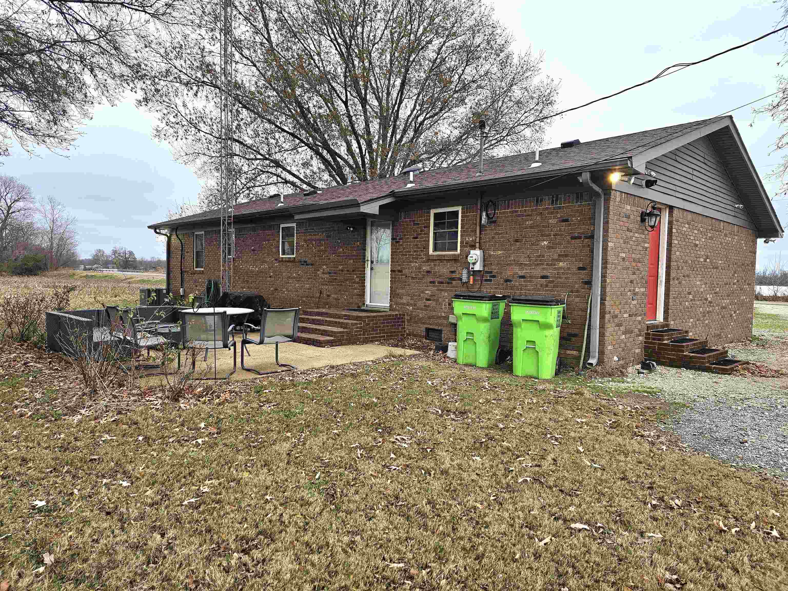 3920 Antioch Highway 51 Road Covington, TN 38019 - Photo 21 of 25 a backyard of a house with yard and outdoor seating