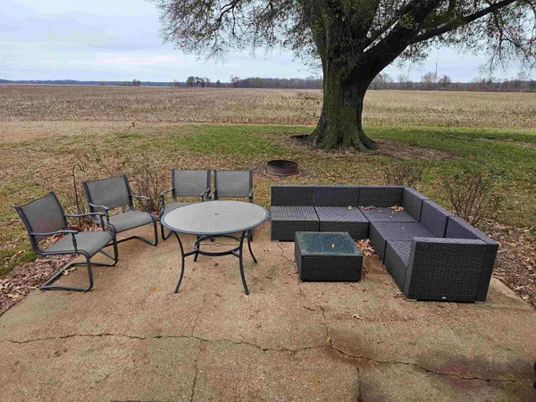 a view of a chairs and table on the terrace