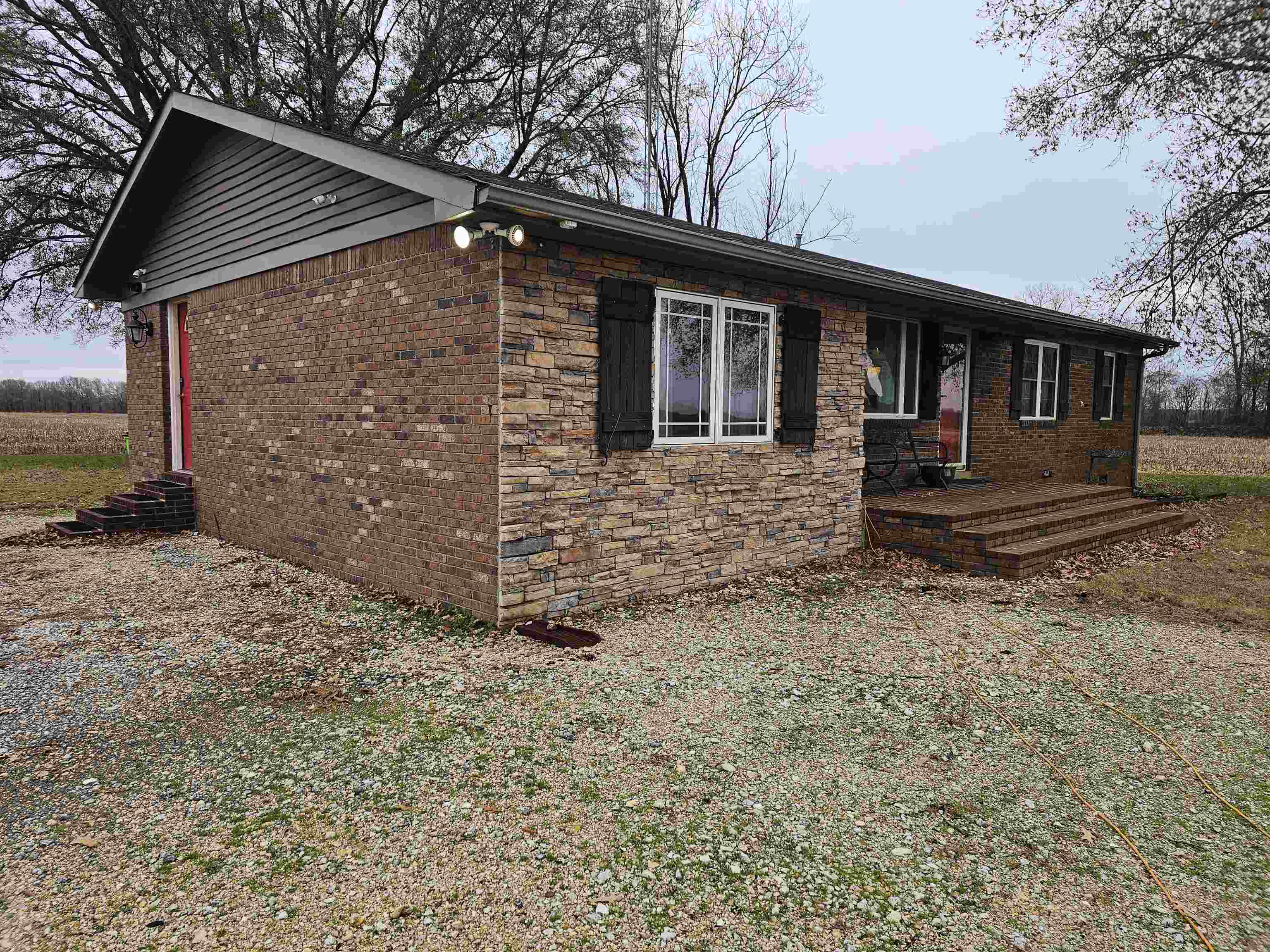 3920 Antioch Highway 51 Road Covington, TN 38019 - Photo 3 of 25 a front view of a house with a yard