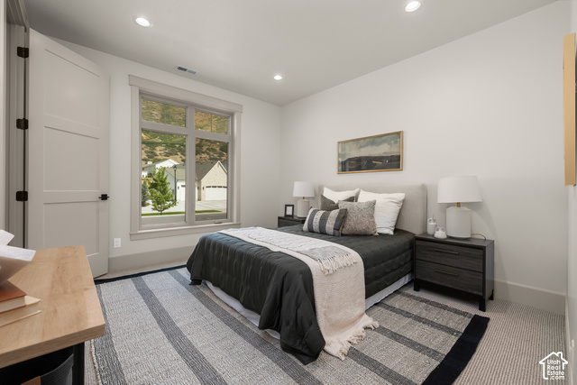 1175 North Elk Rdg Lane, Unit 201 Alpine, UT 84004 - Photo 5 of 38 Recessed lighting illuminates the neutral wall colors and carpeted flooring