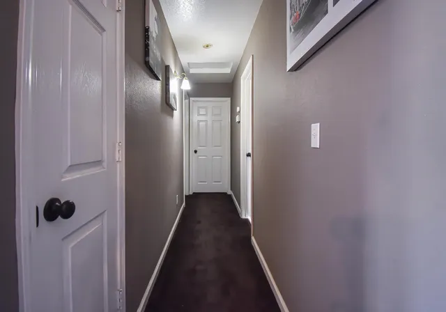 a view of hallway with stairs