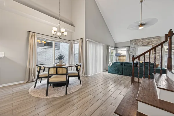 a view of a livingroom with furniture and wooden floor