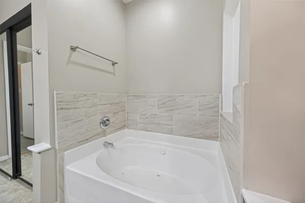 a bathroom with a bathtub