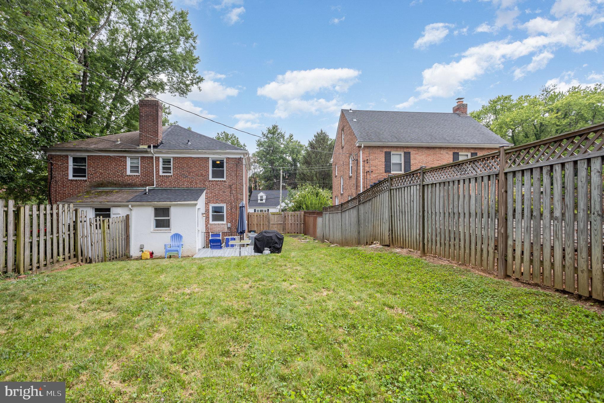 6309 Clearspring Road Baltimore, MD 21212 - Photo 18 of 18 a view of a house with a yard and deck