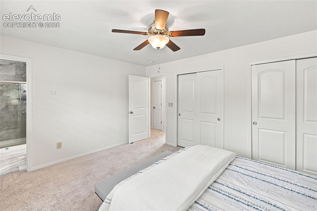 1239 Suncrest Way Colorado Springs, CO 80906 - Photo 28 of 46 Primary bedroom - main level