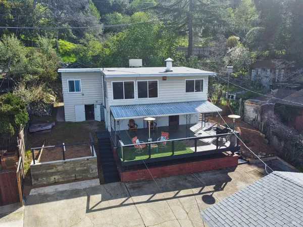 front view of a house with a yard