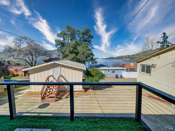 a view of a chairs and table in a patio