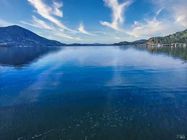 an aerial view of a house with outdoor space