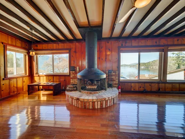 a view of gallery with wooden floor