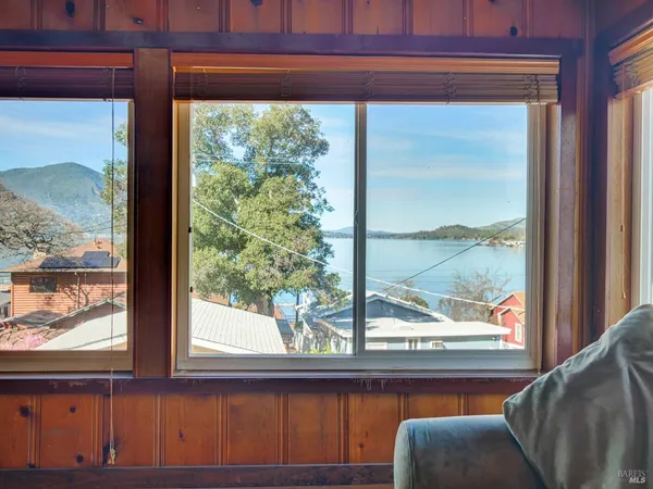 a view of a balcony with chairs