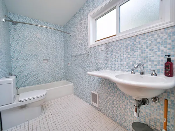 a view of a lake with a yard