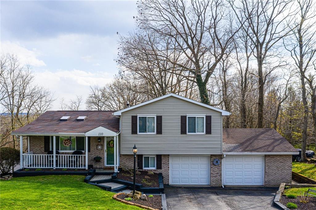 Beautiful multilevel home with a  large yard and a view.  The house also has extra parking spaces (6 extra) in the driveway and on the street.