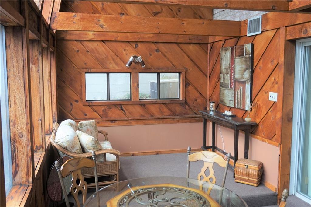 110 Sturm Lane Rochester, PA 15074 - Photo 17 of 24 Additional space in the sunroom to get away and relax after a long day.