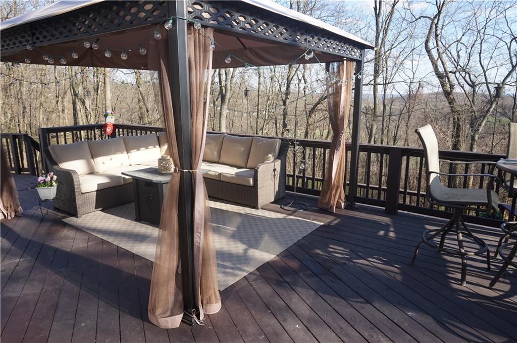 110 Sturm Lane Rochester, PA 15074 - Photo 23 of 24 Canopy on the top tier of the deck which stays with sale of the house (furniture not included). Beautiful view.