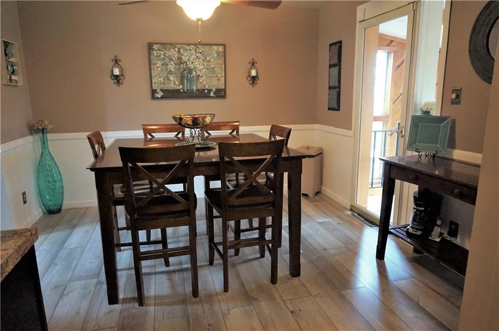 110 Sturm Lane Rochester, PA 15074 - Photo 4 of 24 Beautiful dining room off the kitchen with a balcony view of the sunroom and of the large private backyard.