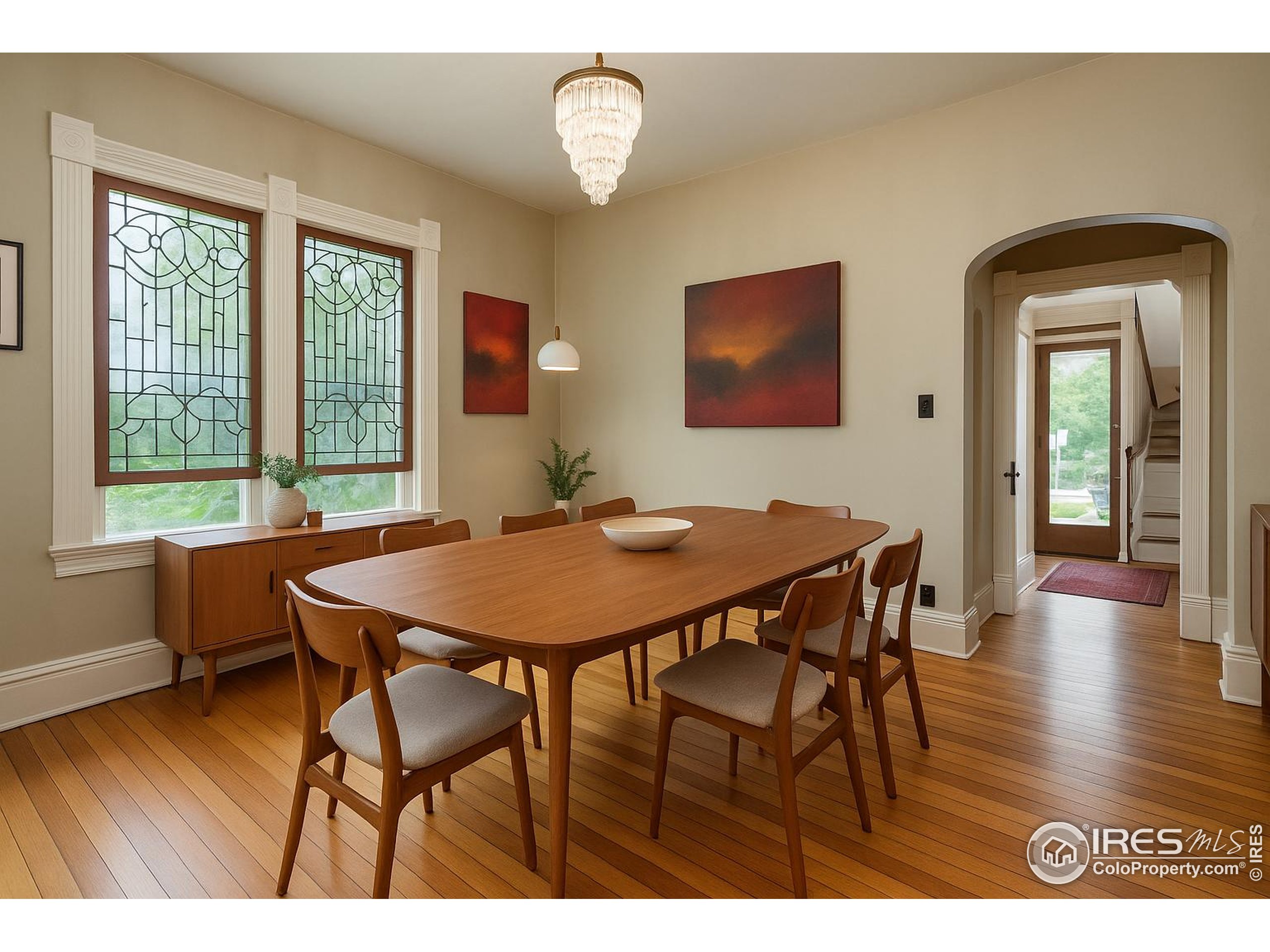 643 Mapleton Avenue Boulder, CO 80304 - Photo 17 of 50 a view of a dining room with furniture and wooden floor