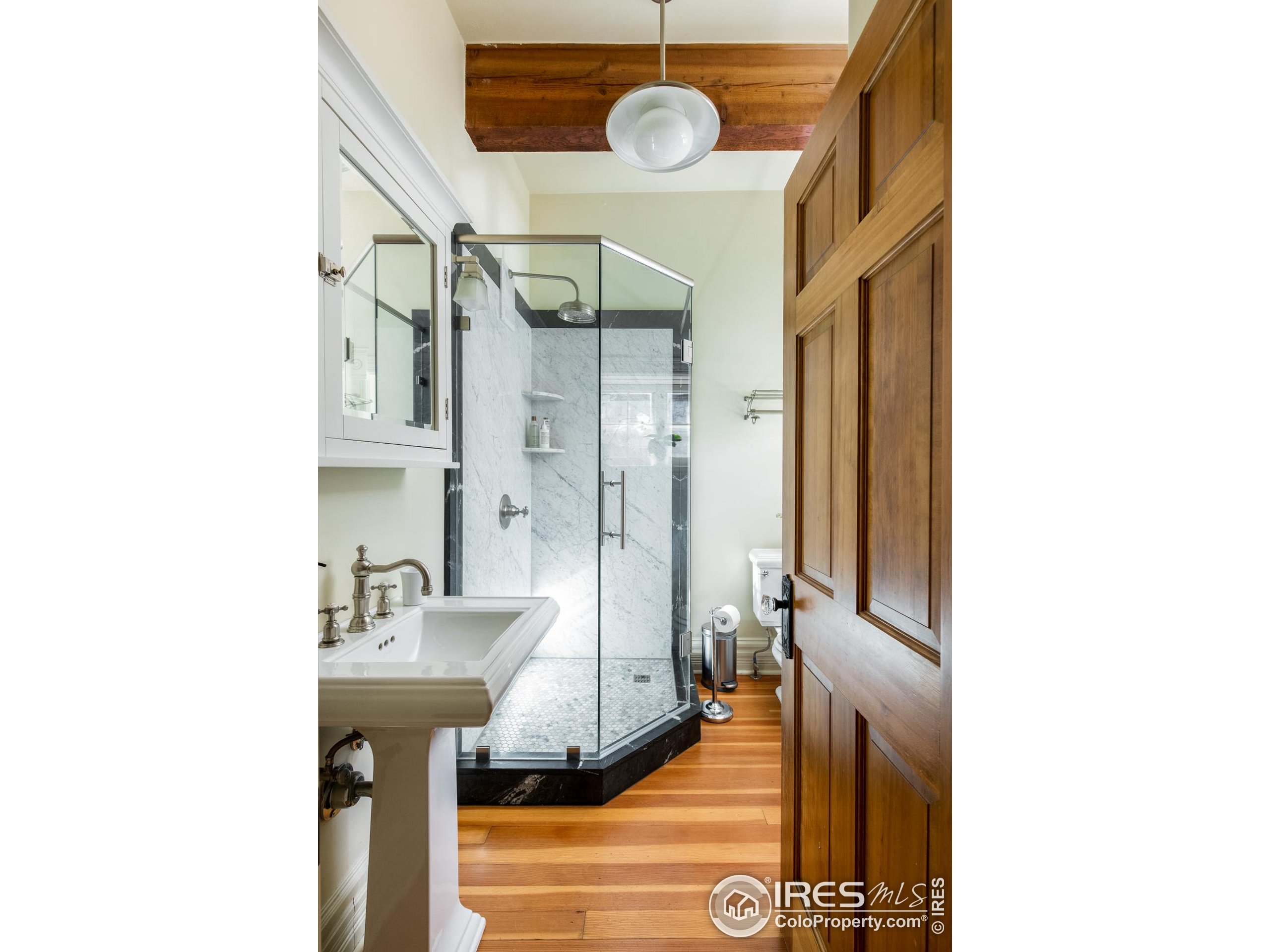 643 Mapleton Avenue Boulder, CO 80304 - Photo 23 of 50 a bathroom with a sink and a mirror
