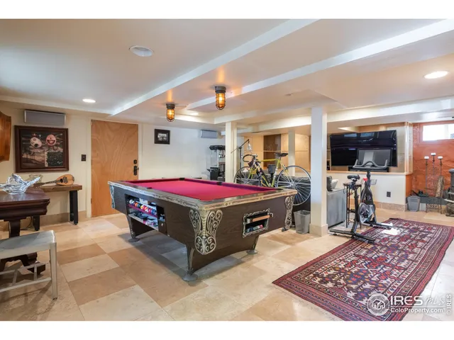 a backyard of a house with barbeque oven